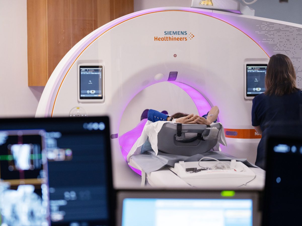 a woman in a CT machine