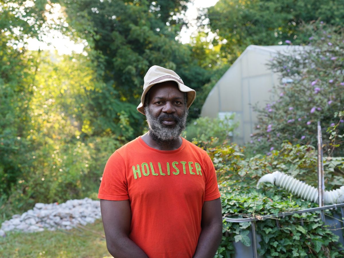 Michael Banner is standing in his backyard in Winston-Salem.